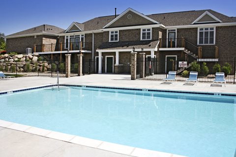 Relaxing Swimming Pool With Sundeck at Colonial Pointe at Fairview Apartments, Bellevue, Nebraska